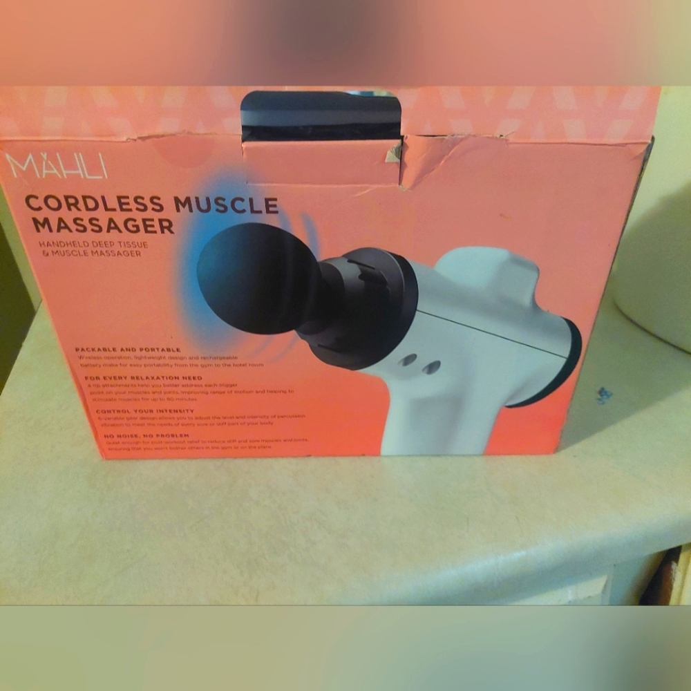 Muscle massager it's never been used . It has different vibration settings